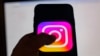 This picture taken in Istanbul on August 2, 2024, shows the logo of the social network Instagram on a smartphone.