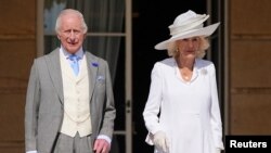 დიდი ბრიტანელის მეფე ჩარლზ III და მისი მეუღლე დედოფალი კამილა 