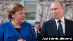 Cancelara Germaniei, Angela Merkel, și președintele Federației Ruse, Vladimir Putin