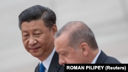 Turski predsjednik Redžep Taip Erdoan i kineski predsjednik Xi Jinping, 2. juli 2019. 