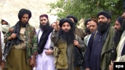 FILE: The Tehrik-e Taliban Pakistan has been in disarray in recent years after several of its top leaders such as Maulana Fazlullah (C) were killed by U.S. drone strikes on both sides of the Pakistan Afghanistan border.