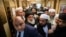 Taliban officials gets into an elevator as they attends the "intra-Afghan" talks in Moscow on February 6.