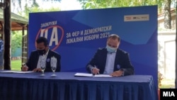 Премиеорот и лидер на СДСМ Зоран Заев и потпретседателот на ВМРО-ДПМНЕ, Владо Мисајловски потпишаа Кодекс за фер и демократски избори