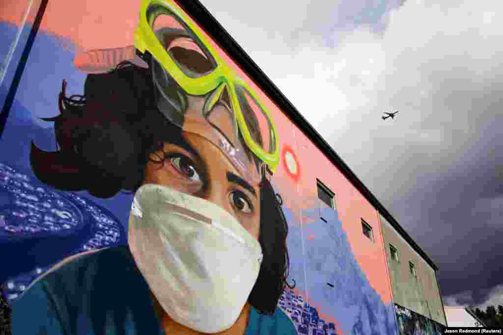 Мурал &bdquo;Моето дете, нашиот воздух&ldquo; од Крег Кундиф е прикажан во населбата Џорџтаун во Сиетл