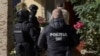 Moldovan police take part in raids on people associated with Russian mercenary groups.