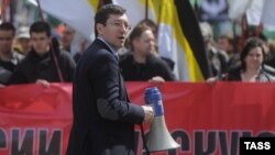 Националист Александр Поткин принимает участие в "Русском марше". Москва, 1 мая 2013 года. 