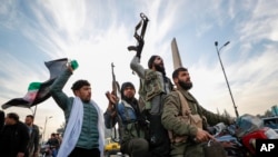 Rebelii sărbătoresc preluarea controlului în capitala Siriei, Damasc. 8 decembrie 2024