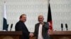Pakistani Prime Minster Nawaz Sharif (L) shakes hands with Afghan President Ashraf Ghani during a press conference at the Presidential palace in Kabul on May 12.