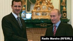 Башар Асад и Владимир Путин през 2015 г.