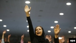 Supporters of Afghan Presidential candidate Abdullah Abdullah listen to his speech during a protest against the preliminary results of Presidential vote, in Kabul, 08 July 2014.