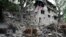 A house lays in ruins in eastern Afghanistan following a massive earthquake.