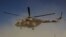 An Afghan helicopter during an offensive against Taliban insurgents in Kunduz in September 