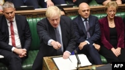 Premierul britanic Boris Johnson în cursul dezbaterii din Parlament, 19 octombrie 2019. 