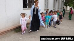 Turkmen authorities have ordered public-sector workers to enroll their children in state kindergartens that were left almost empty after a fee increase. (file photo)