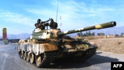 FILE: A Pakistani tank during a military operation in the Khyber Pass.