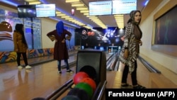 FILE: Afghan women play at a bowling club in Mazar-e Sharif.