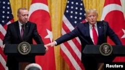 Recep Tayyip Erdogan și președintele american, Donald Trump, la Washington, noiembrie 2019.