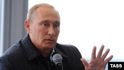 Тверская область. Президент России Владимир Путин во время выступления на встрече с участниками десятого Всероссийского молодежного форума "Селигер-2014". Фото ИТАР-ТАСС/ Михаил Климентьев