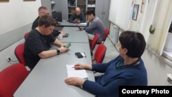 Journalists of the publication "Nasha Gazeta" in their editorial office