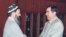 Tajik President Emomali Rahmon (right) meets with Said Abdullo Nuri, the leader of the United Tajik Opposition, in Dushanbe in December 1997.
