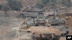 ისრაელის არმიის ტანკები ლიბანის საზღვართან. 2024 წლის 1 ოქტომბერი