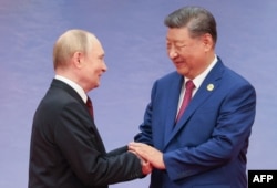 Presidenti rus, Vladimir Putin, dhe presidenti kinez, Xi Jinping, në Tianjin, Kinë, më 31 gusht.
