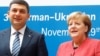 Володимир Гройсман і Анґела Меркель на Німецько-українському діловому форумі, Берлін, 29 листопада 2018 року