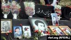 FILE: A protest demonstration to demand justice for the victims of war crimes in Afghanistan.