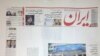 Iranian Power Struggle Emerges In Newspaper Headline
