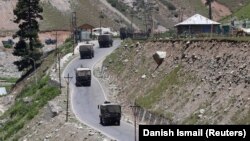 An Indian army convoy moves towards Leh, the capital of the Ladakh region on June 15.