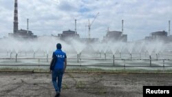 Експерт од Меѓународната агенција за атомска енергија во инспекција на украинската нуклеарна централа Запорожје, која беше запленета од руските сили во март 2022 година.
