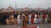 Relatives and residents offer funeral prayers for a executed prisoner in eastern Pakistan in January.