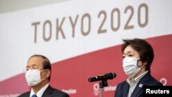 Toshiro Muto (lijevo) i Seiko Hashimoto rekli su da žele poduzeti mjere u promicanju spolne ravnopravnosti